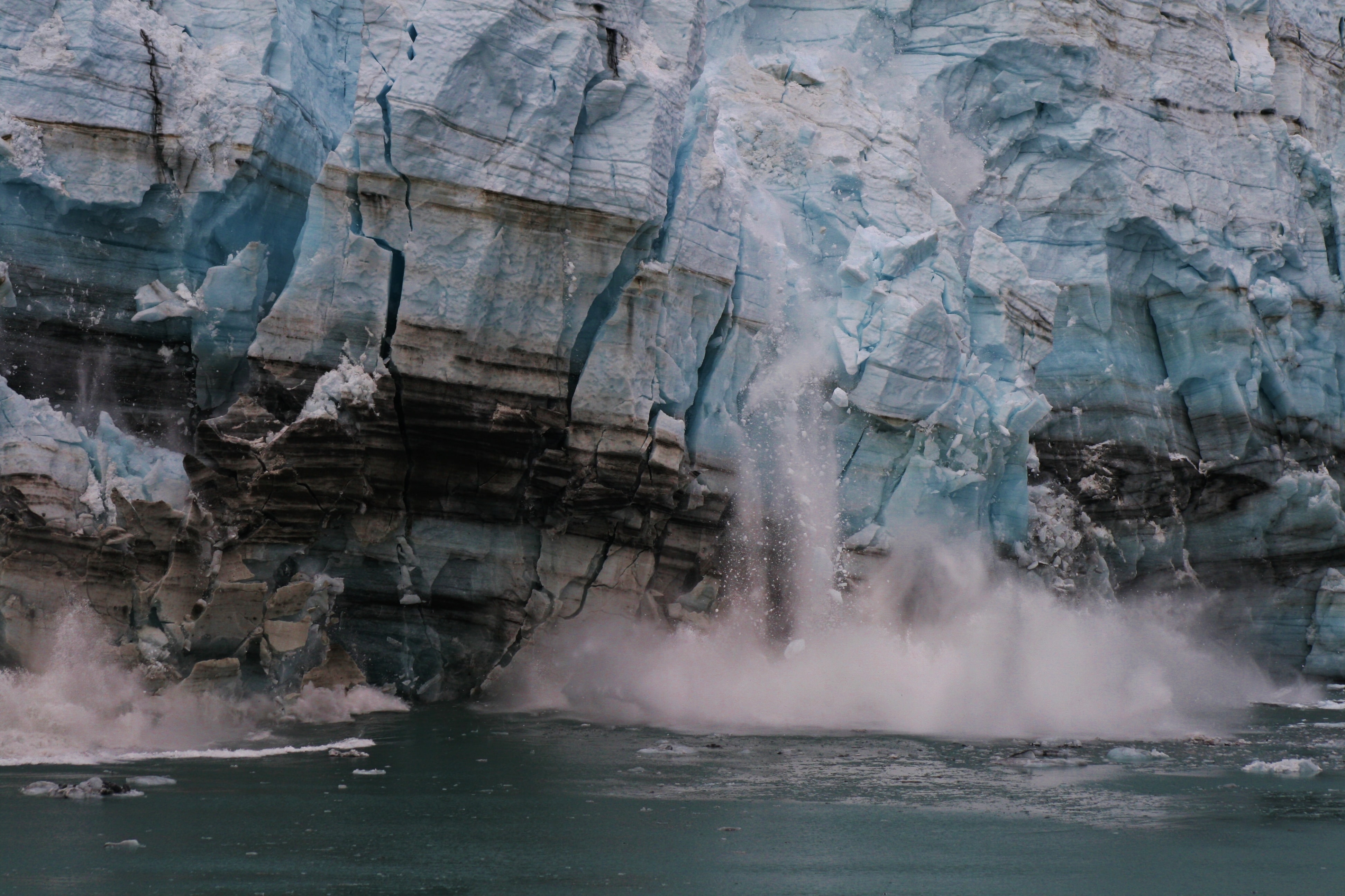 Glacier collapsing into the water